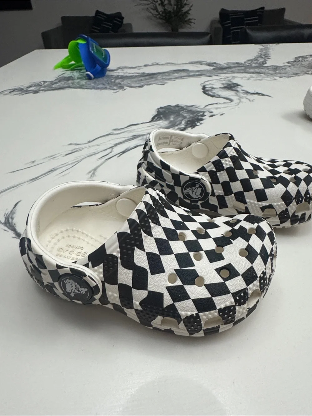 CROCS Kids Checkerboard Slip-On Clogs in Black and White